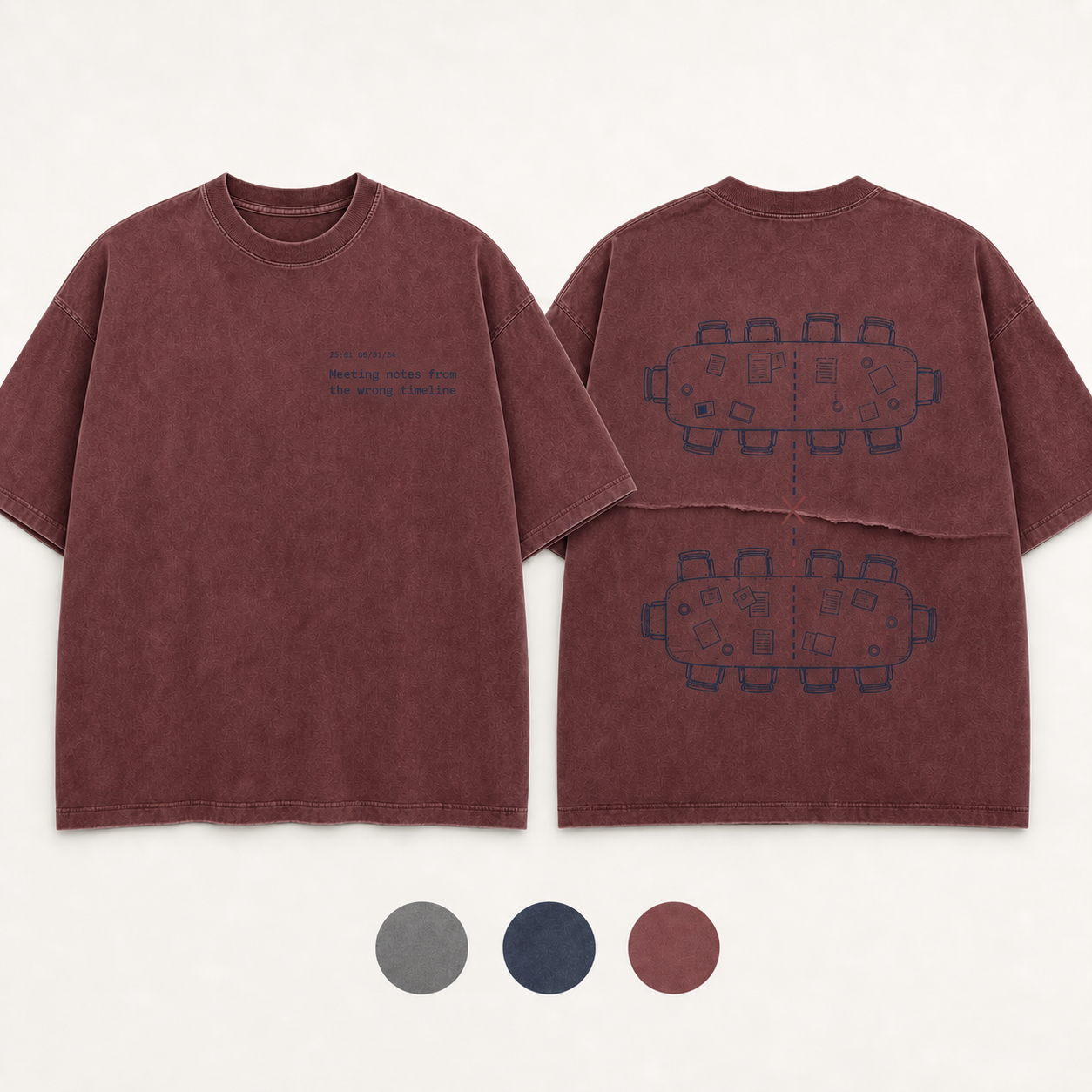 Washed Oxblood Color. Front and back of a mineral-gray oversized tee with an impossible meeting timestamp and parallel tables exchanging notes through a page fold.