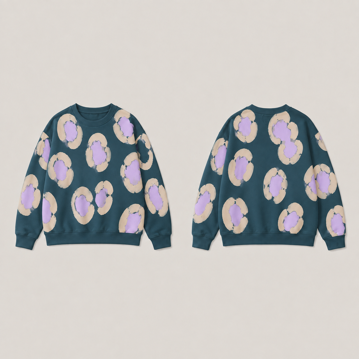 Front and back of a petrol crewneck with large broken oat rosettes and pale-lilac centers, with plain petrol ribs.