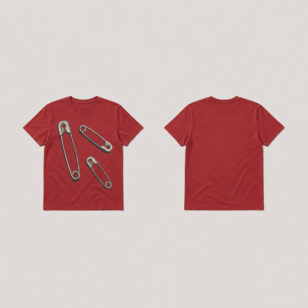 Front and back of a muted-red fitted tee with the matching three closed-pin illustrations and charcoal shadows, with plain back.