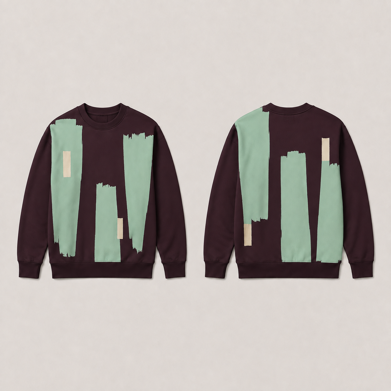 Front and back of a dark fig crewneck sweatshirt with uneven mint painted columns and small sand rectangles.