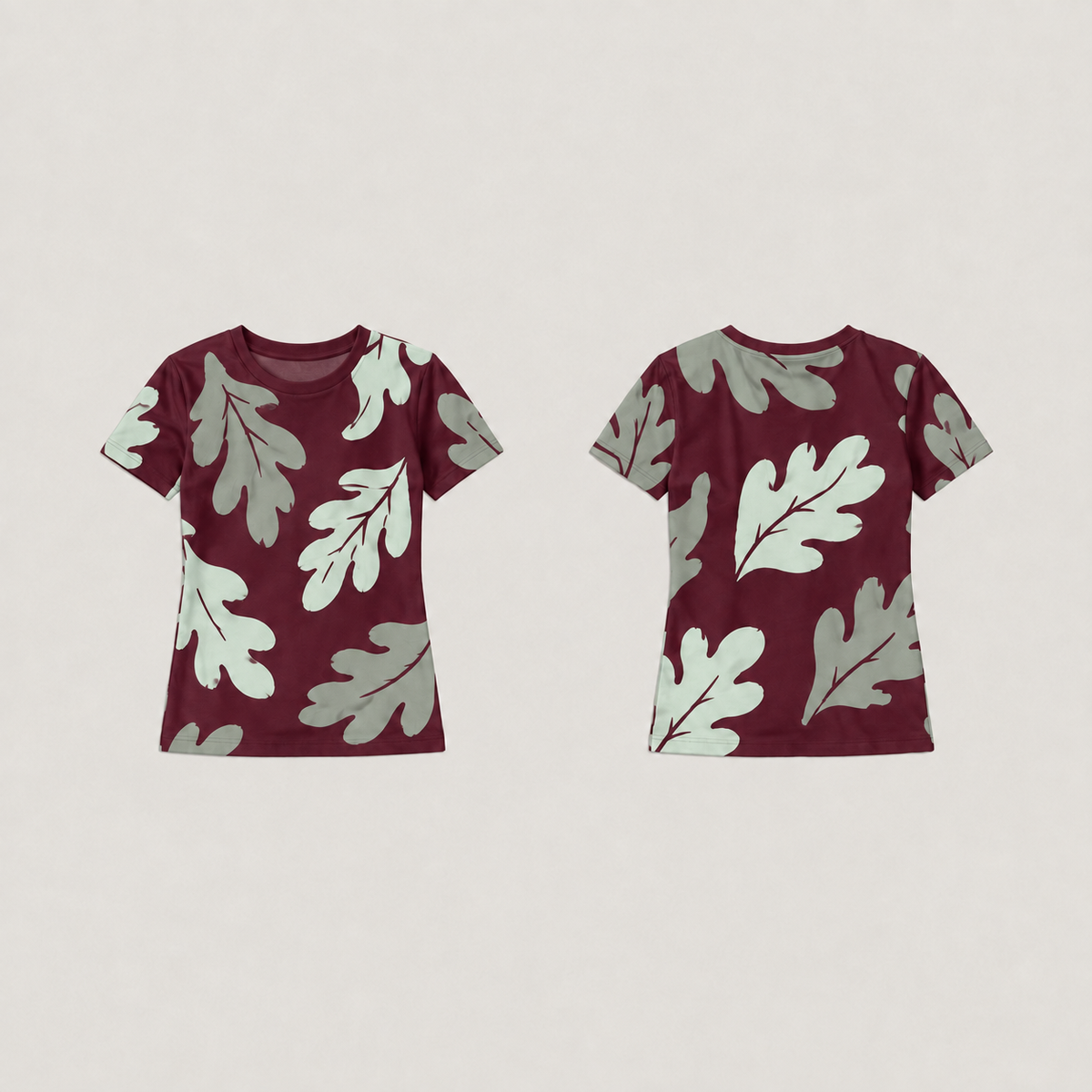 Front and back of a wine fitted tee with large pale-celadon and gray-green leaves and a plain wine neckline.