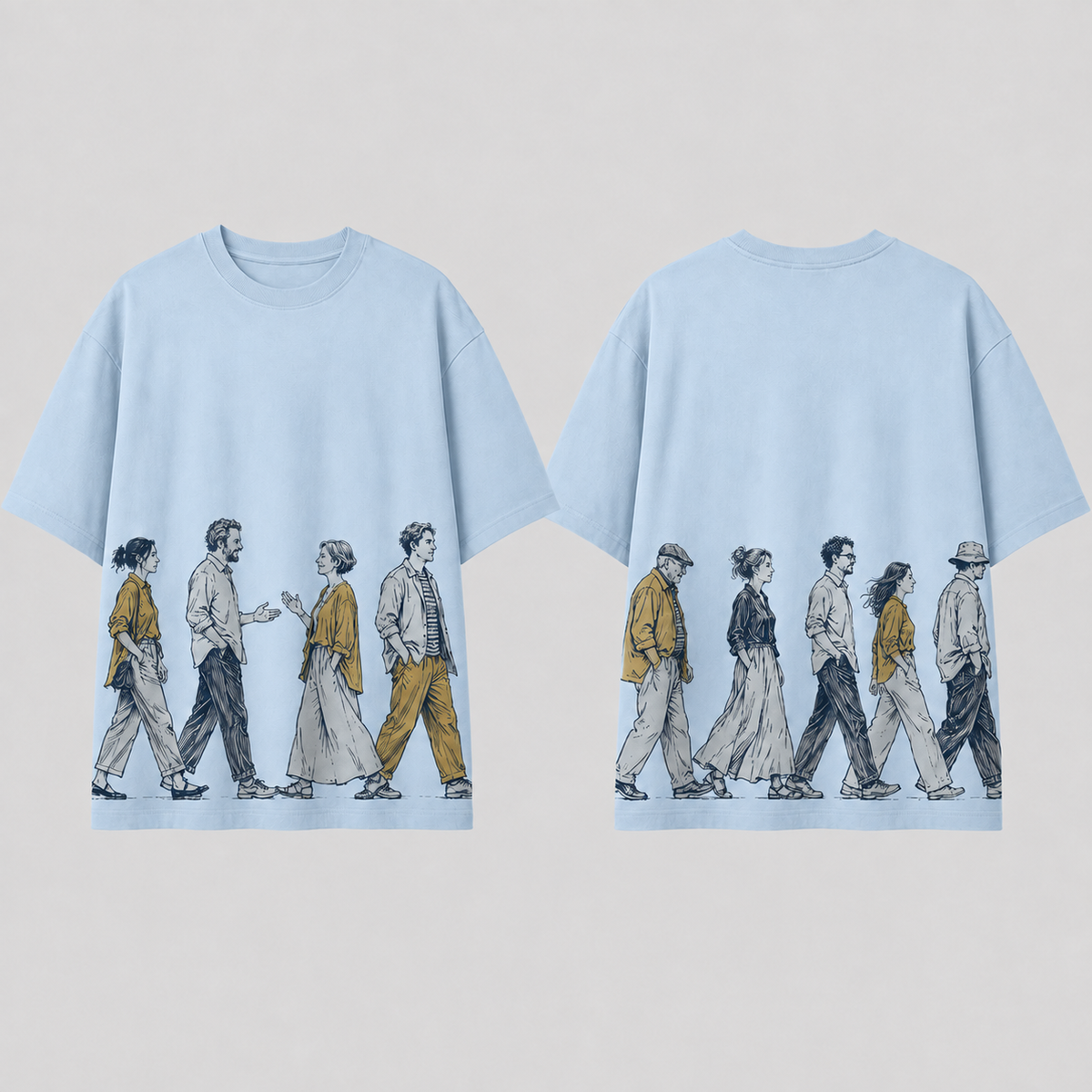 Front and back of a pale-blue oversized tee with the same ink-and-ochre procession continuing around the lower body above the straight hem.