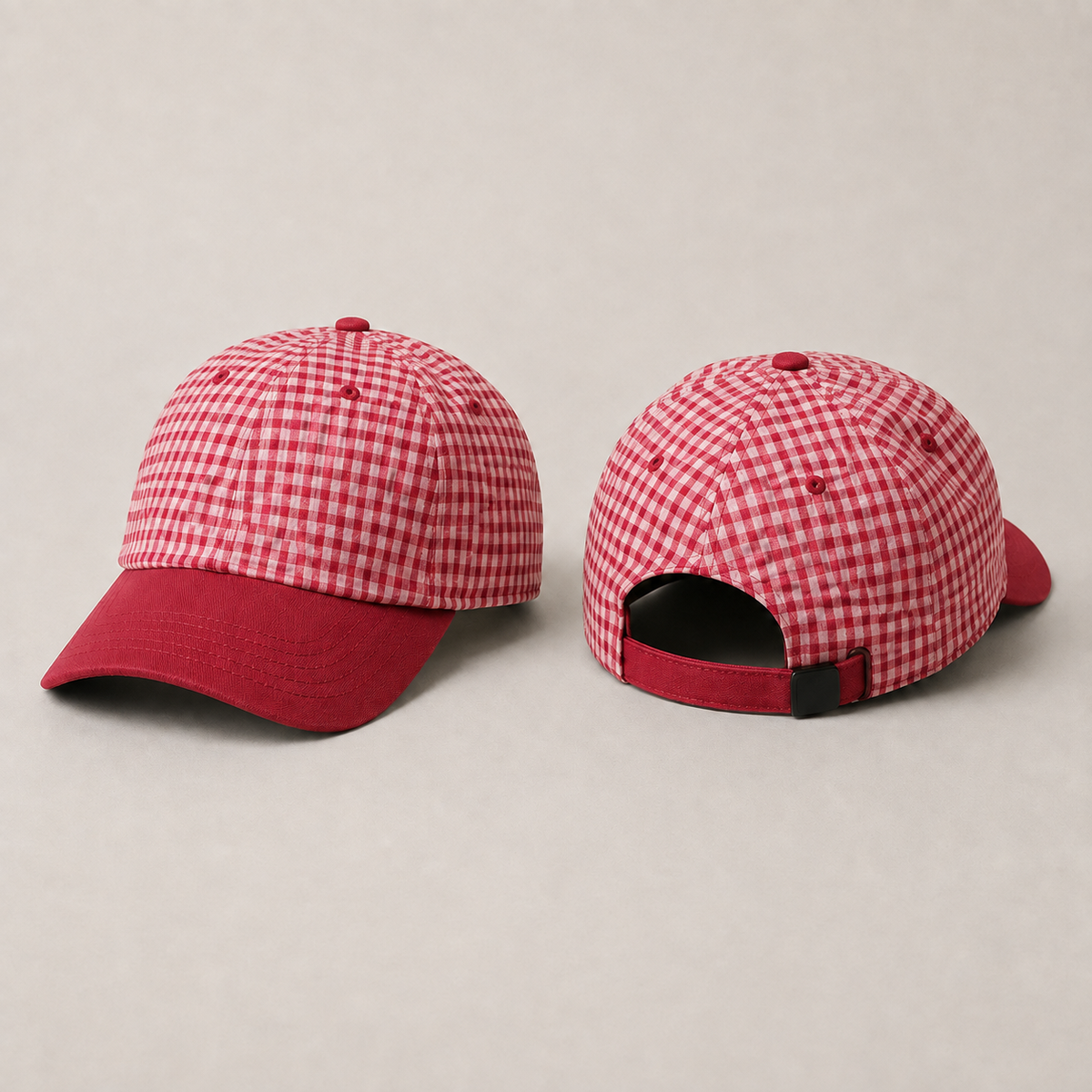 Front and rear views of the same cap in rhubarb-red and pale-pink check with a solid red peak and strap.
