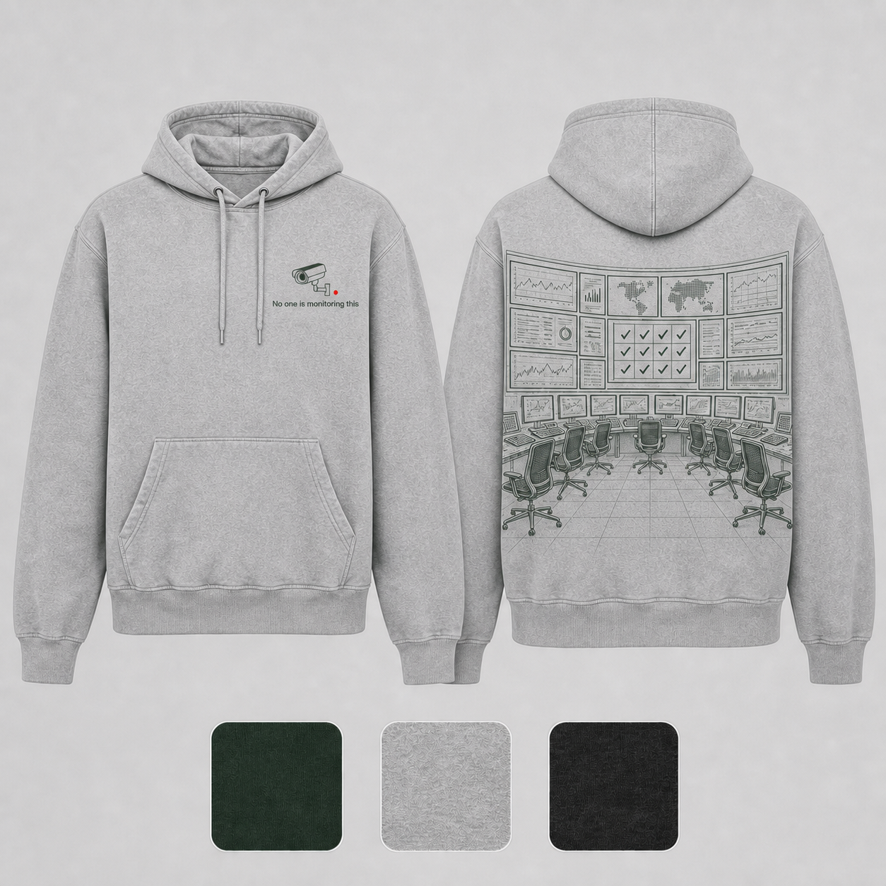 Heather Ash Color. Front and back of a deep-forest pullover hoodie with an idle camera light and an empty operations room reporting perfect attendance.