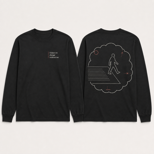 Front and back of an ink-black long-sleeve tee with contract-footer text and a negative-space figure leaving a revision cloud.