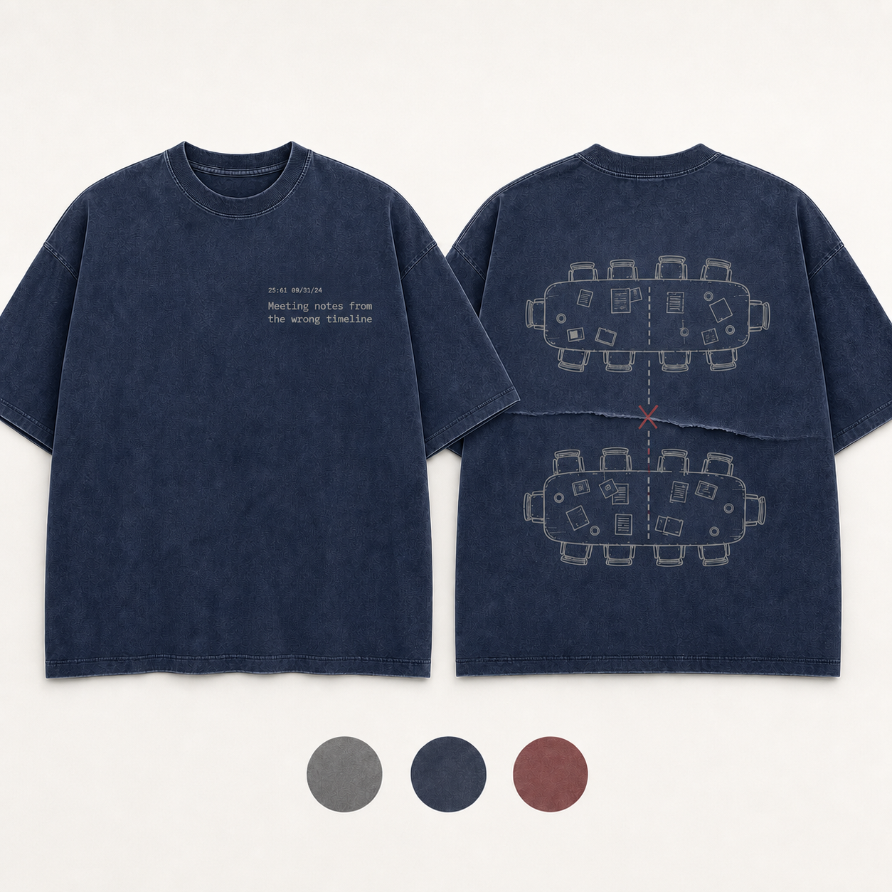 Faded Navy Color. Front and back of a mineral-gray oversized tee with an impossible meeting timestamp and parallel tables exchanging notes through a page fold.