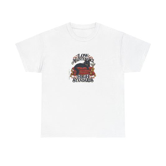 White Low Maintenance Tee, front view with black cat reclining on red cushions and “LOW MAINTENANCE HIGH STANDARDS” graphic.