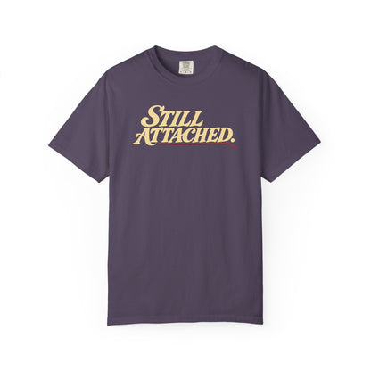 Supplier-generated Still Attached Tee mockup 1: Wine Comfort Colors 1717 with the current front and back artwork placement.