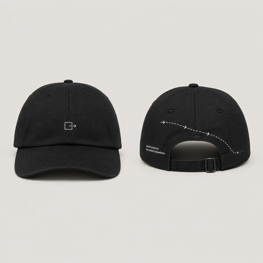 Front and rear views of a black low-profile cap with a small exit icon and an instructional arrow path.