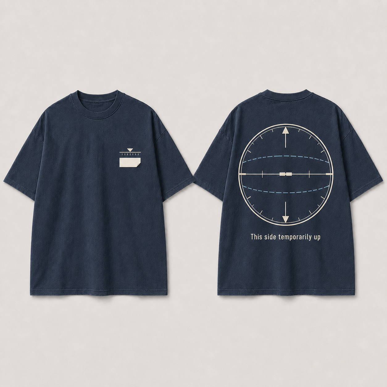 Midnight-blue heavyweight tee with a rotating horizon and altimeter framing This side temporarily up.