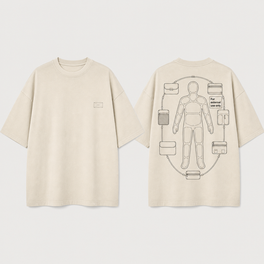 Front and back of a bone heavyweight tee with a boundary stamp and a diagrammatic figure whose inner compartments remain sealed.