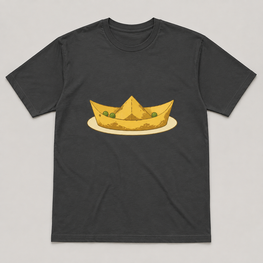 Charcoal tee design with a golden omelette folded like a boat and three peas on a cream plate.