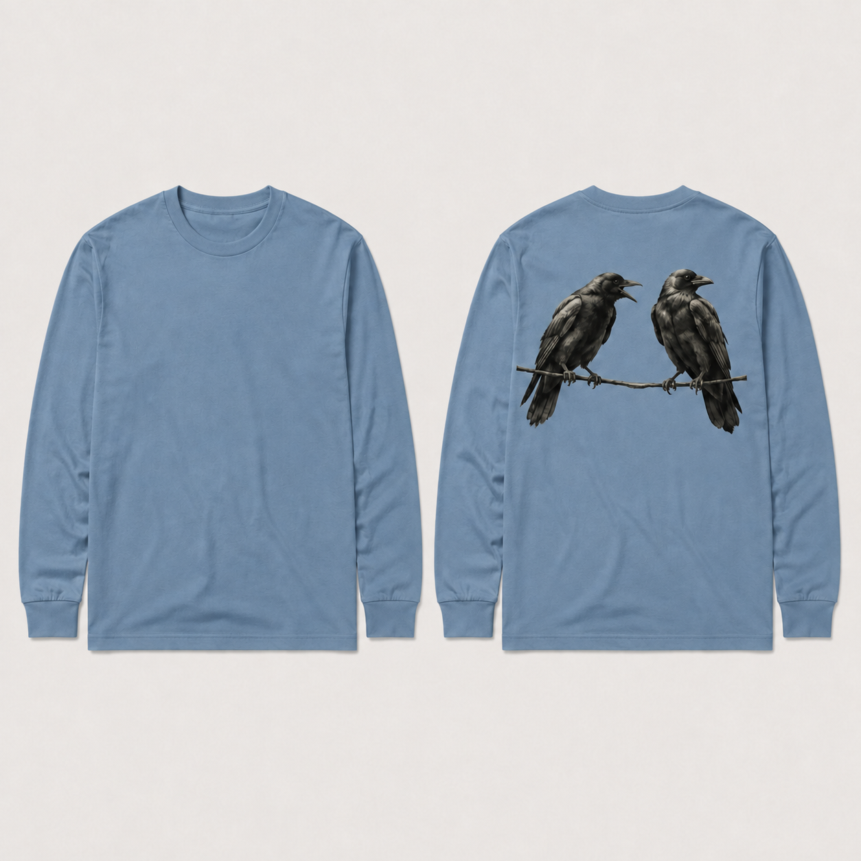 Front and back of the same two-crow long-sleeve concept in muted blue.