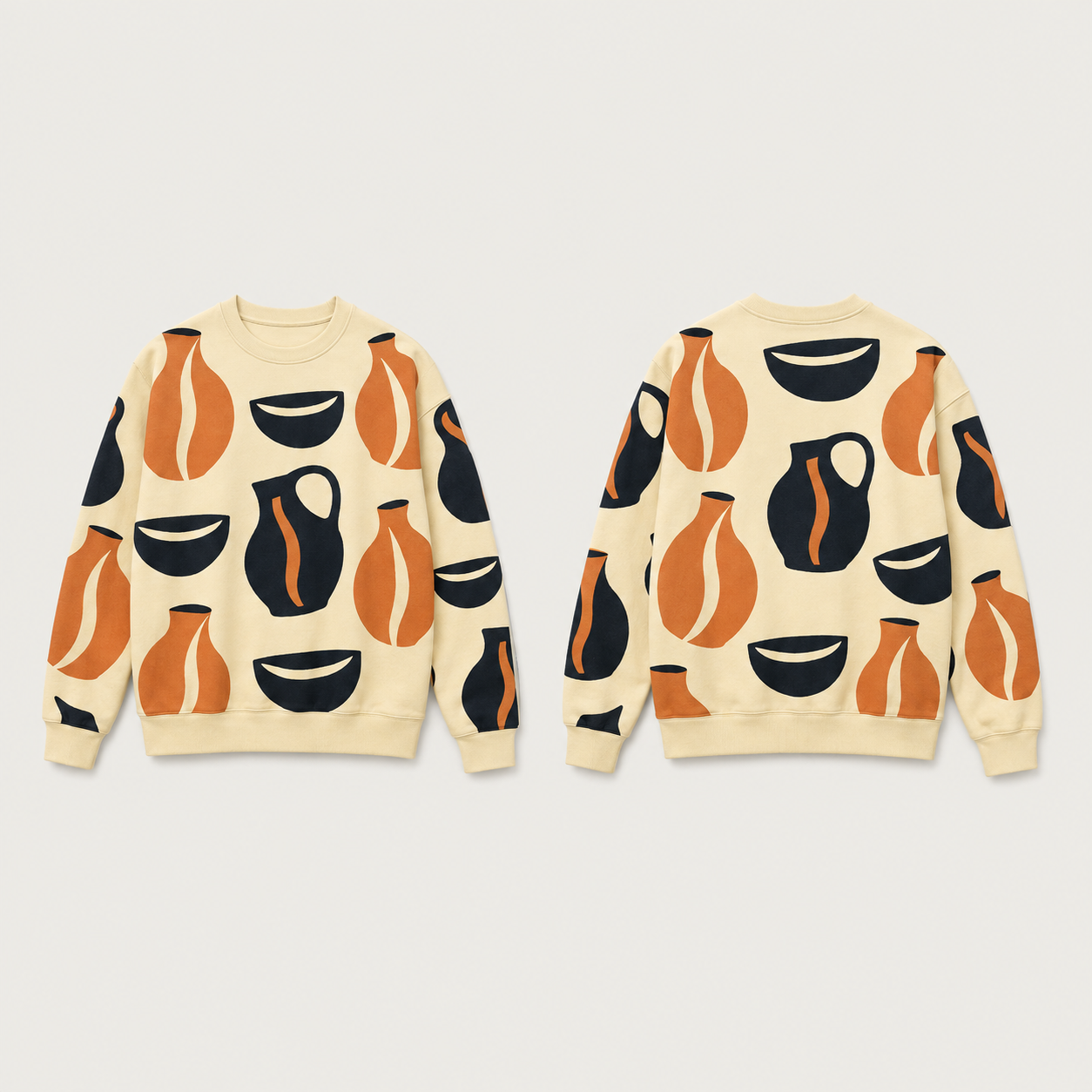 Front and back of a butter crewneck covered with large ink bowls, mandarin vessels and ink handled jugs, with plain butter neckline, cuffs and hem.