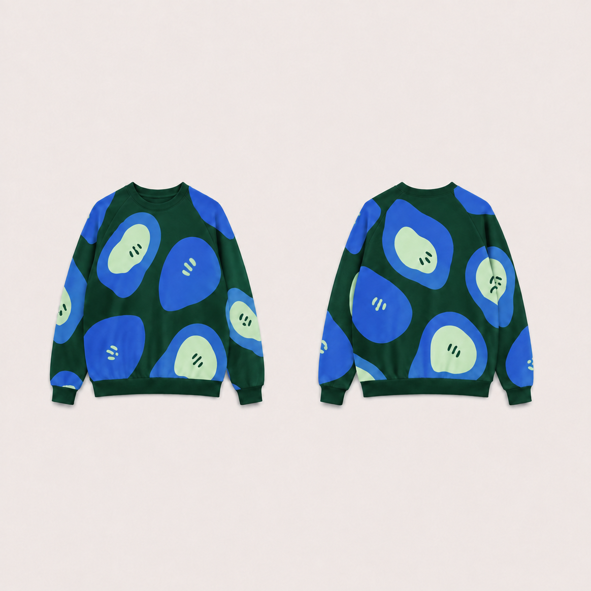 Pine raglan crewneck with the same large cobalt fruitlike lobes, celadon inner fields and contrasting seed marks.