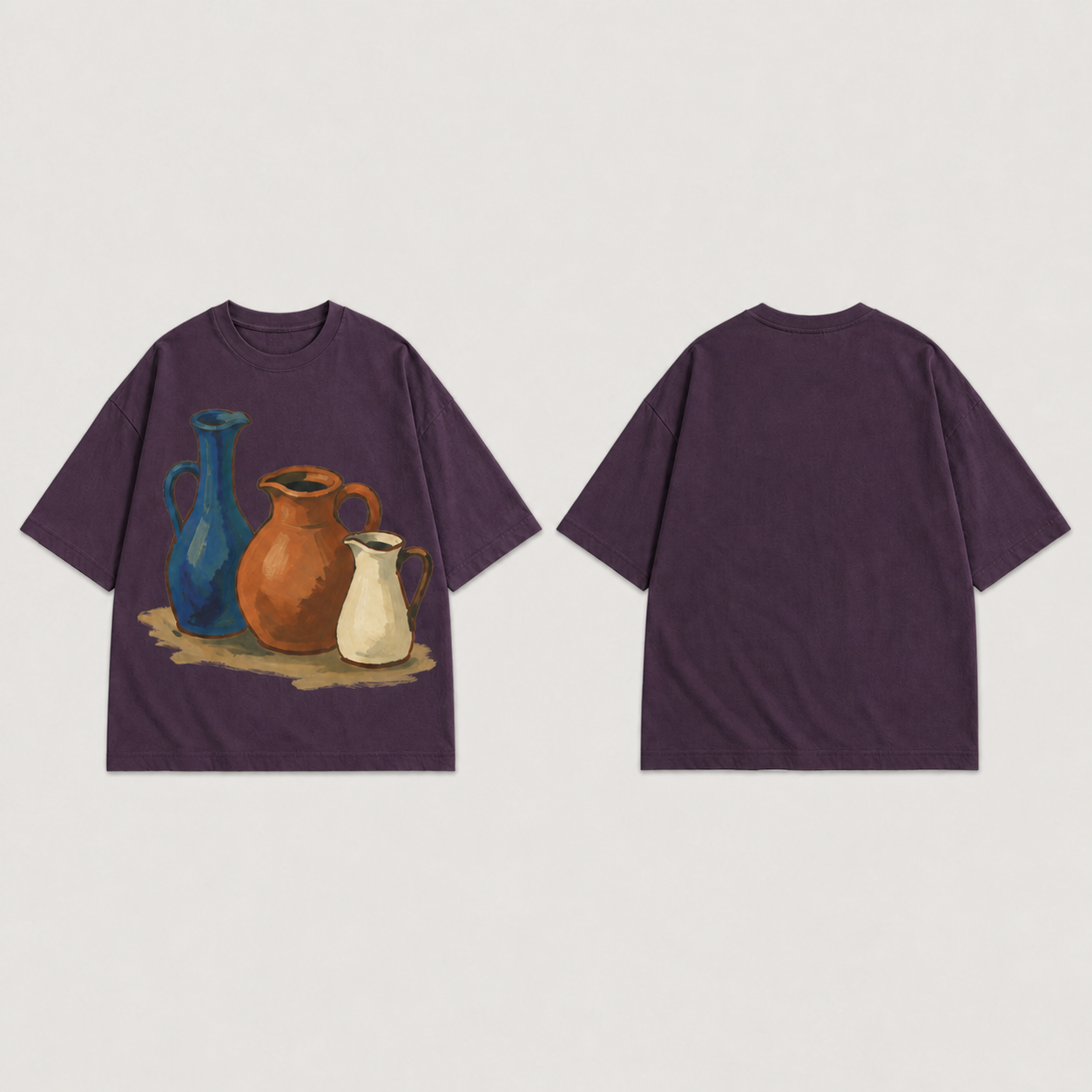 Front and back of a dark-plum oversized tee with three painted blue, terracotta and cream ceramic pitchers on the front and a plain back.