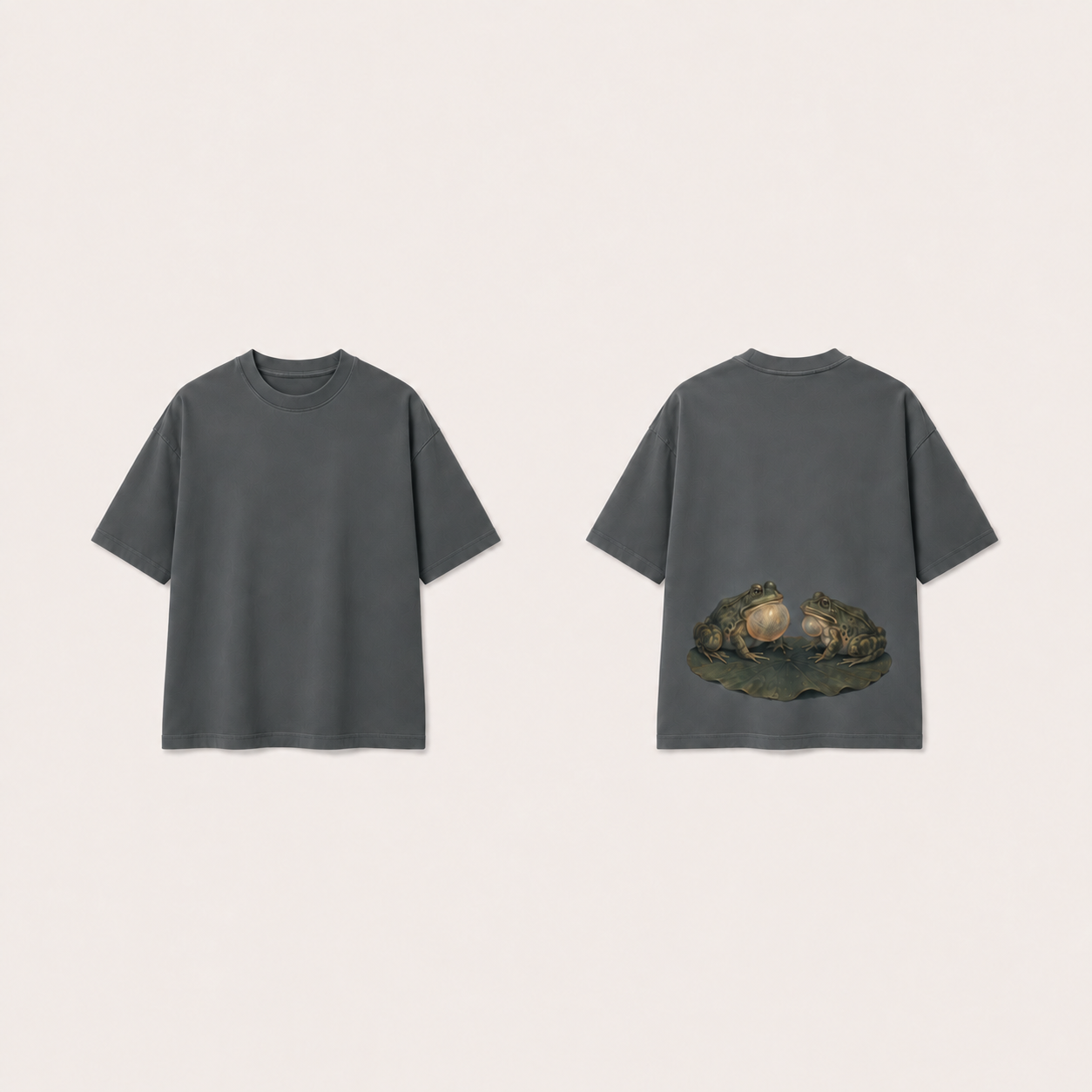 Washed Slate heavyweight tee, plain front and two natural frogs with differently inflated throat sacs on a leaf on the lower back.