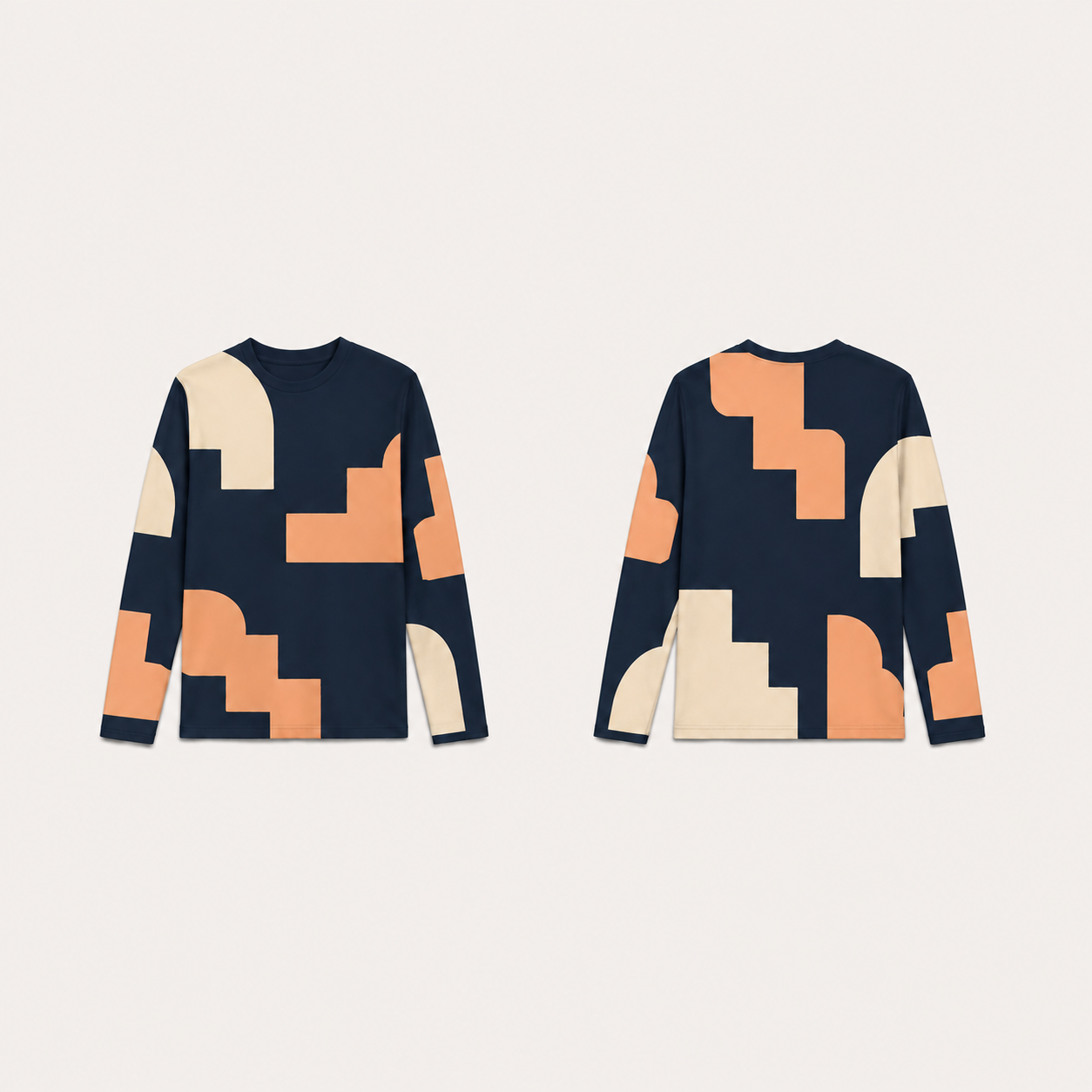 Ink long-sleeve tee with large apricot stepped shapes and chalk rounded fields across front, back and sleeves.