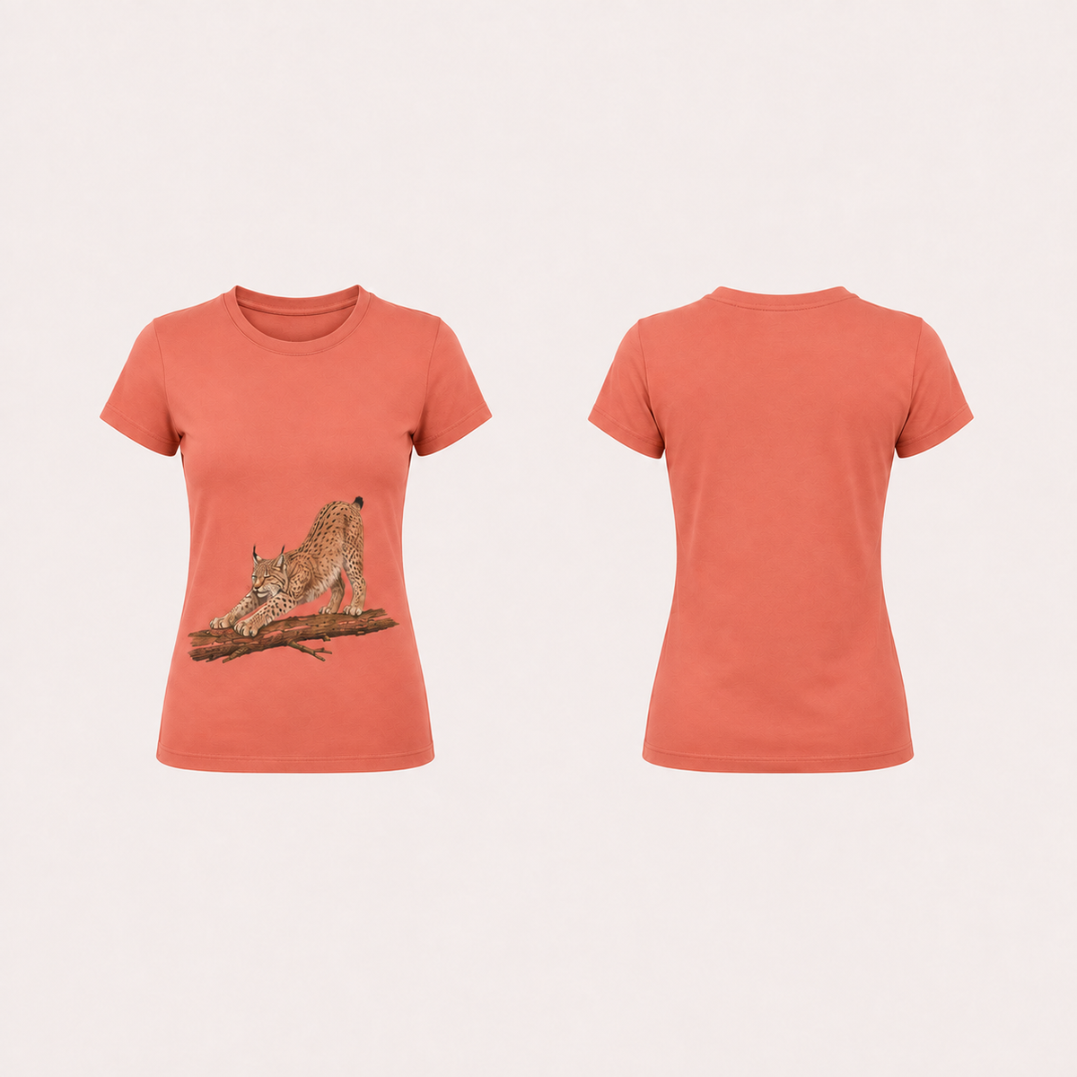 Washed coral fitted tee, front and plain back, with a natural lynx stretching on a branch low on the front.