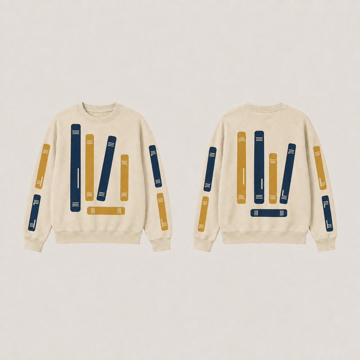 Front and back of a warm oat crewneck with the same bounded book-spine pattern in ink and ochre.
