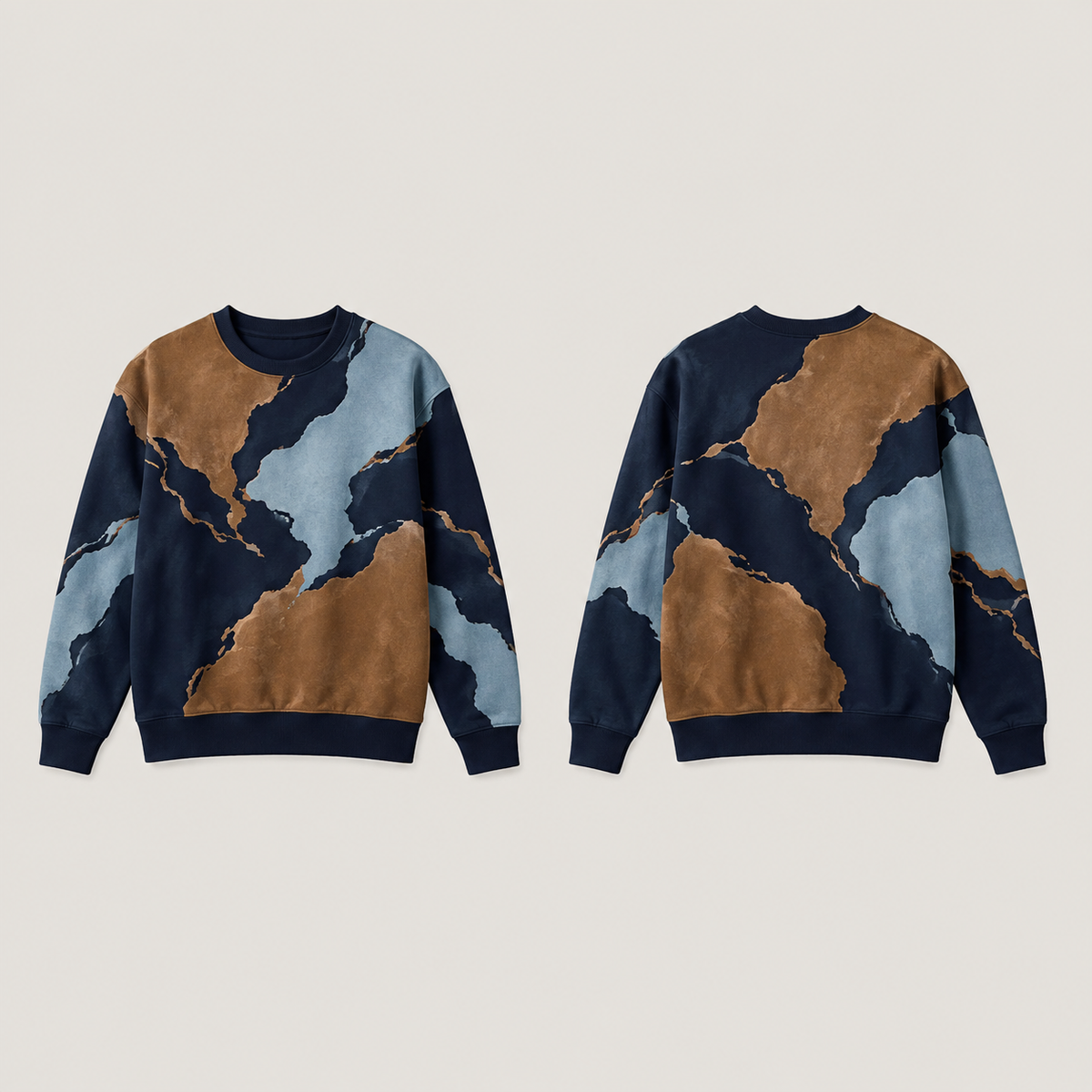 Front and back of an ink navy crewneck sweatshirt with large bronze and ice-blue irregular mineral-like printed fields and plain ribs.