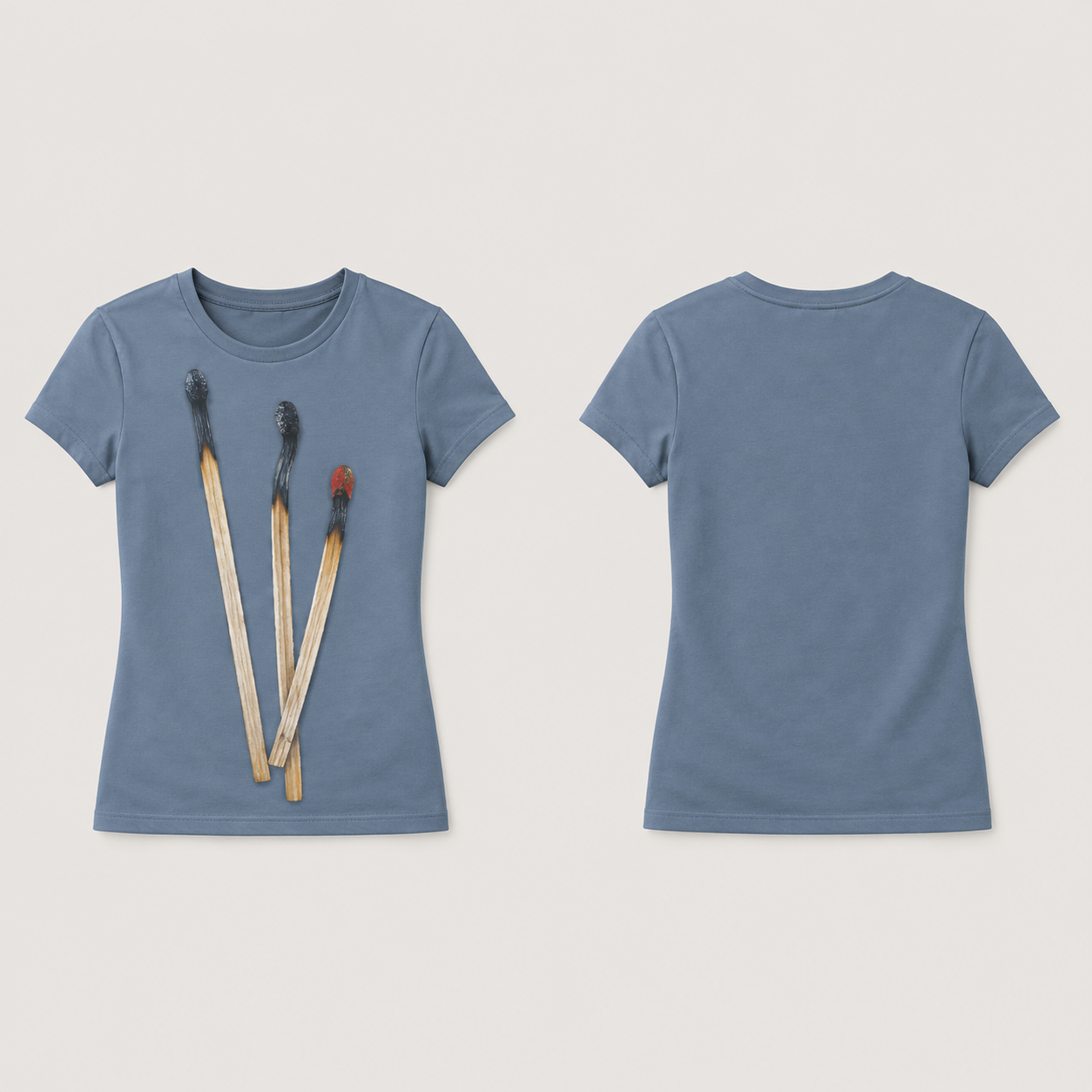 Dusty Blue fitted tee shown front and back, with three used wooden matches in an unequal fan printed on the front.