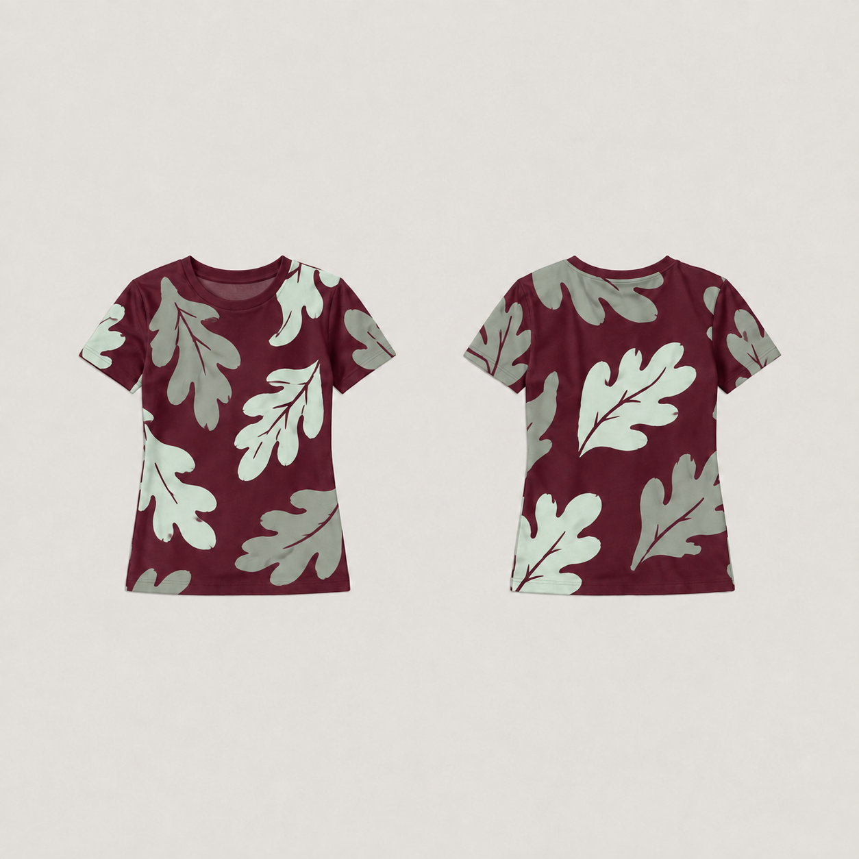 Front and back of a wine fitted tee with large pale-celadon and gray-green leaves and a plain wine neckline.