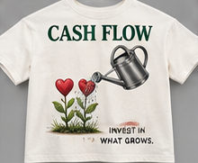 Invest in What Grows: bone tee with a watering can tending a garden of hearts and flowers.