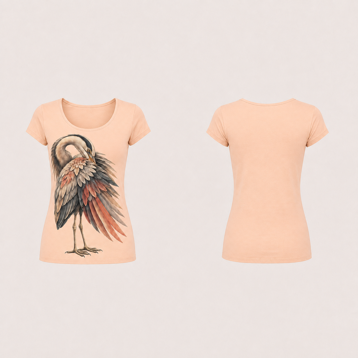 The same fitted scoop-neck tee in pale apricot with the heron picture retained and the back plain.