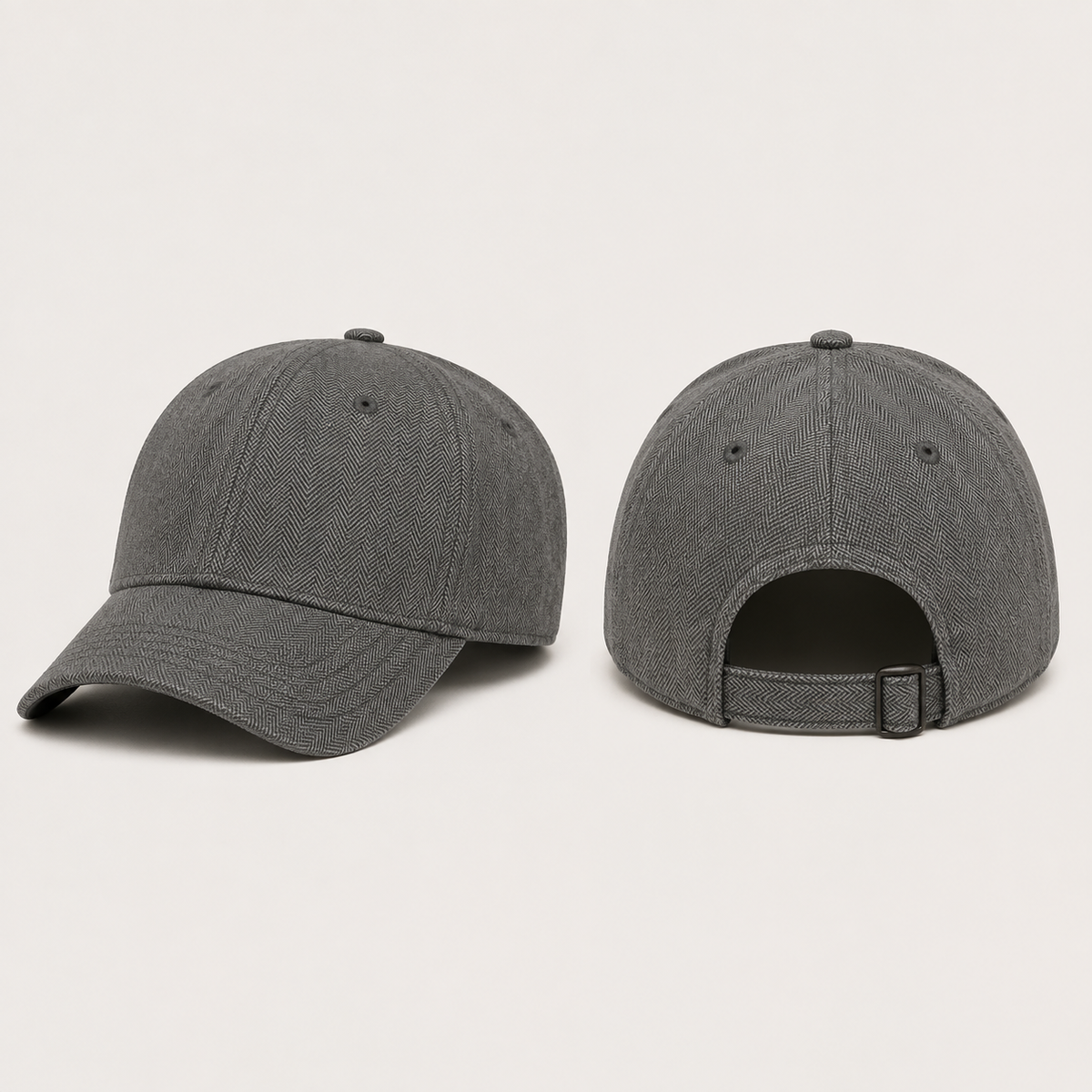 Front three-quarter and rear views of a graphite low-profile cap with fine herringbone texture following the direction of each crown panel.