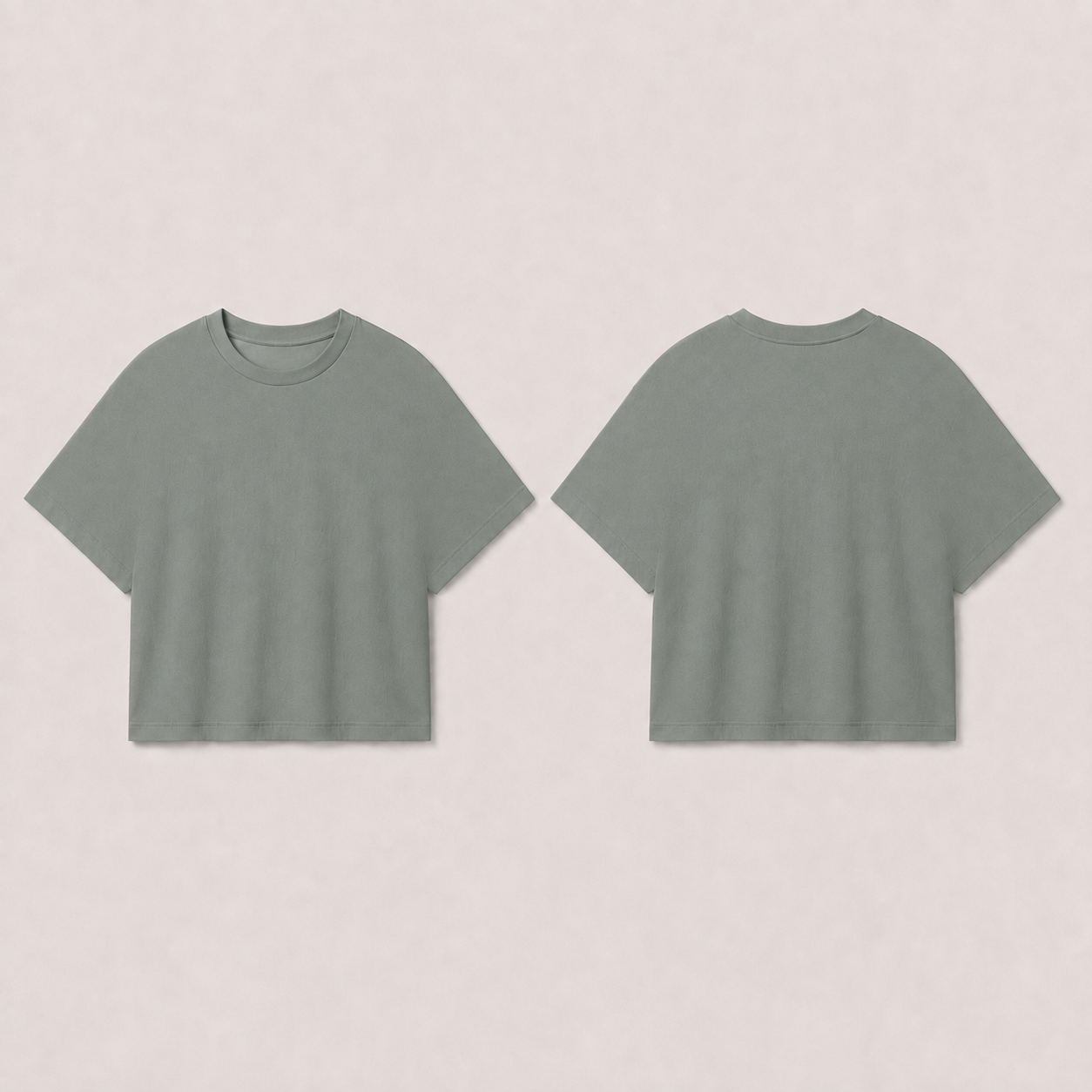 Front and back of a plain slate-green tee with a compact broad body and integral wide short sleeves.