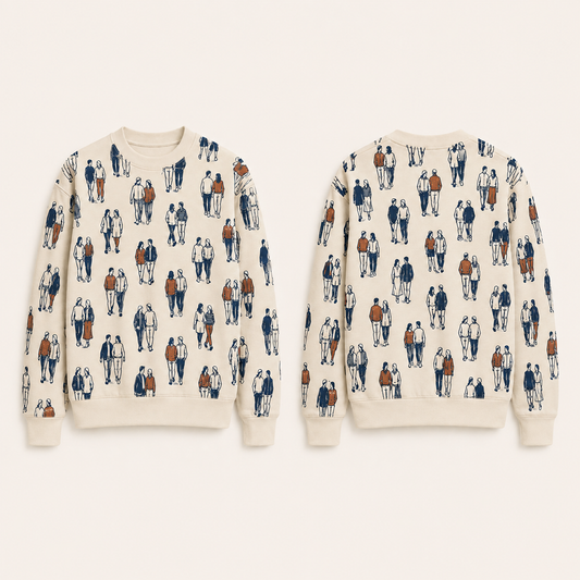 Front and back of a cream crewneck with a compact repeating ink-and-rust pattern of walking pairs and plain collar, cuffs and hem.