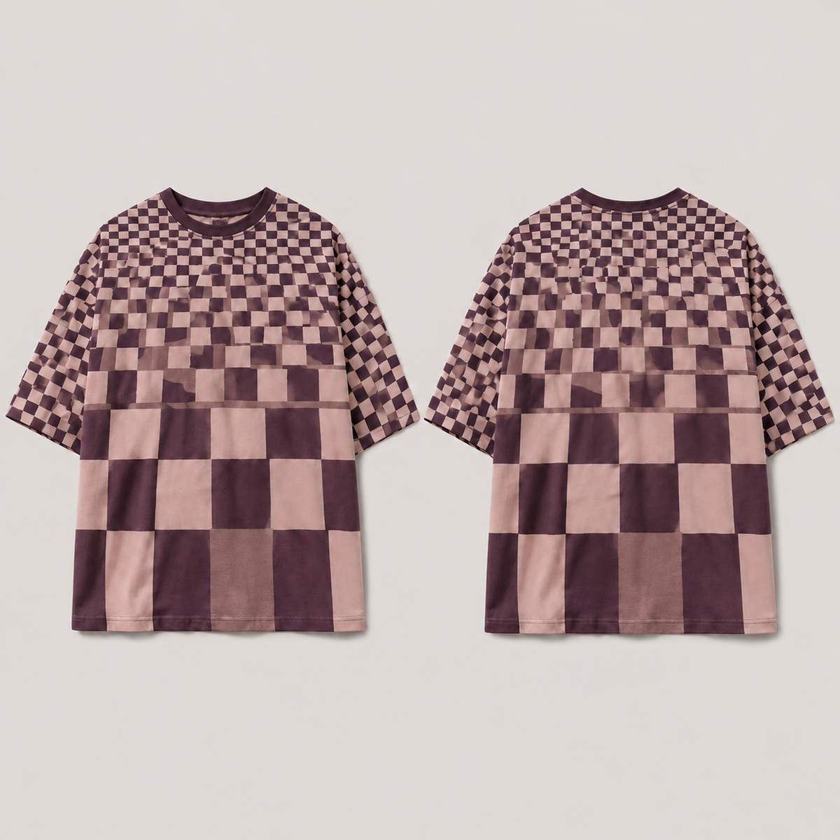 Front and back of an oversized pale-clay, plum and mauve-gray tee with checks increasing in size from shoulder to hem.