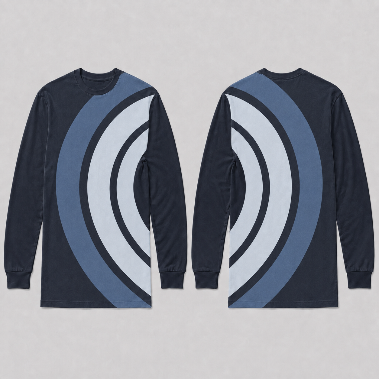 Front and back of an ink-navy long-sleeve tee with broad ice-blue, chalk and steel-blue arcs arranged around the left waist side; both sleeves are plain.
