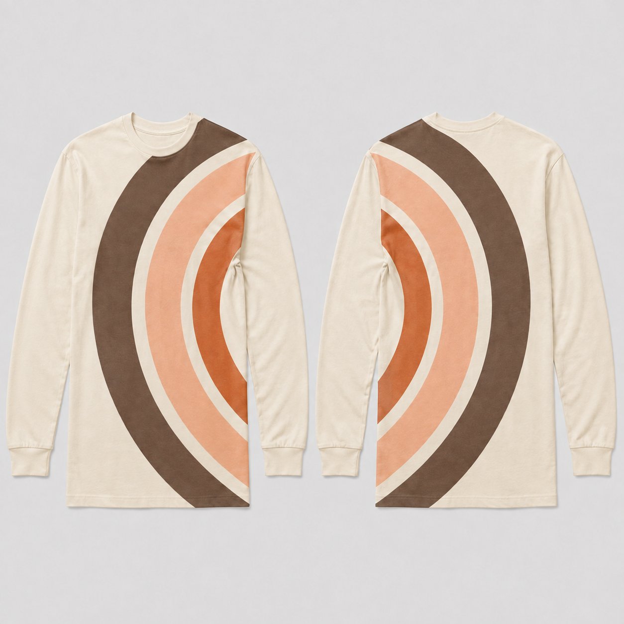 Front and back of a cream long-sleeve tee with broad russet, salmon and brown arcs arranged around the left waist side; both sleeves are plain.