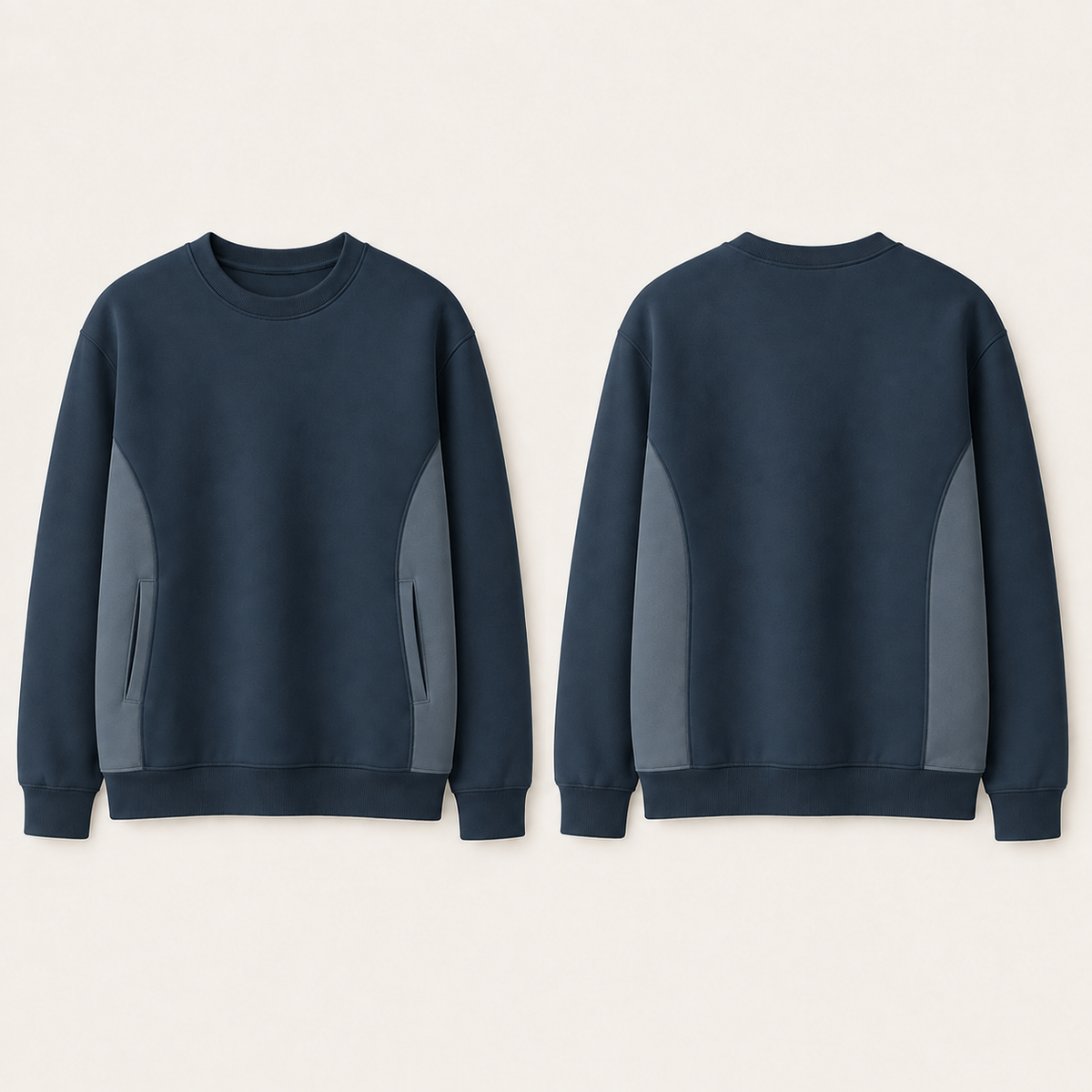 Front and back of an ink-blue crewneck with muted-slate side panels and the same two independent pocket entries.