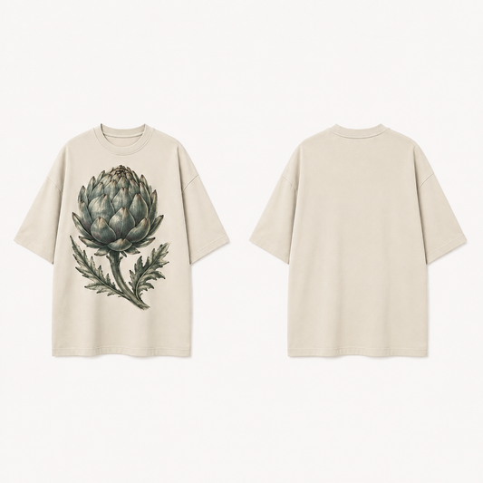 Front and back views of a bone tee with a large closed artichoke, curved stem and two jagged leaves on the front; the back is plain.