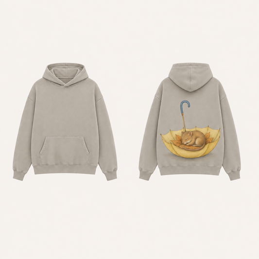 Front and back of a Washed Stone pullover hoodie, with a sleeping dormouse on russet leaves inside an upturned yellow umbrella with a blue hooked handle on the back.