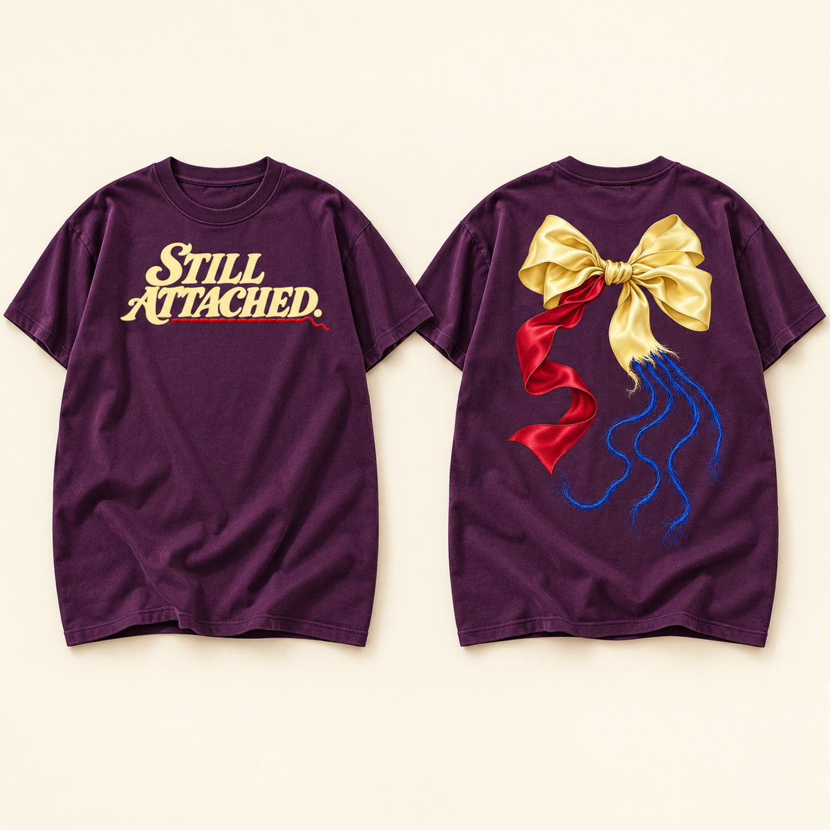 Original Still Attached concept illustration, retained as a design reference. Supplier mockups show the current Wine tee and verified print placement.