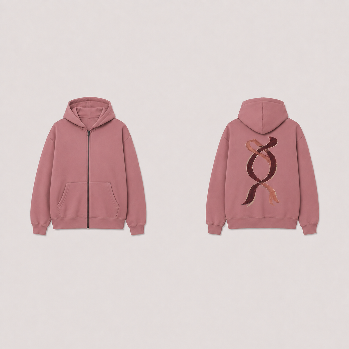 The same zip hoodie in dusty rose, retaining the back ornament, closed zipper and plain front.