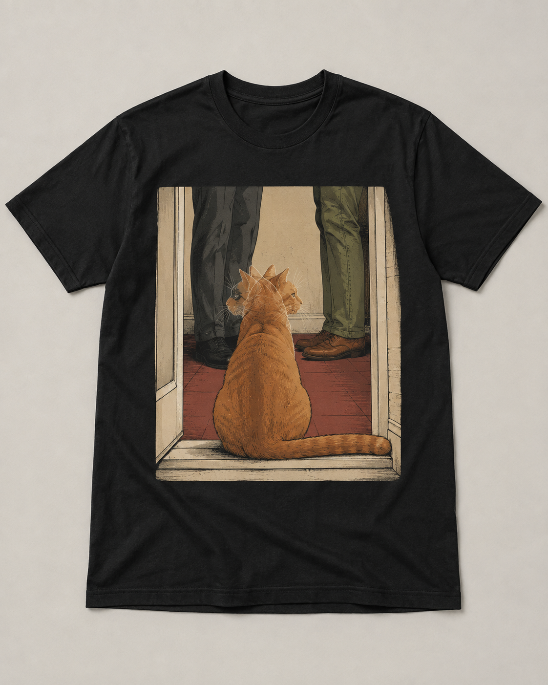 Soft-black tee design with a ginger cat turning its head between two visitors at a doorway.